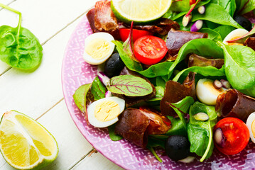 Spring salad with herbs and jerky