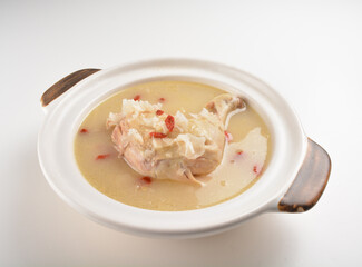 hot double boiled Chinese herbal ginseng chicken soup in claypot asian halal menu