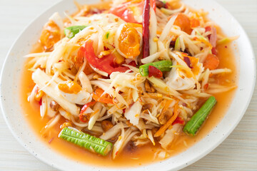 Som Tum - Thai Spicy green papaya salad with salty eggs