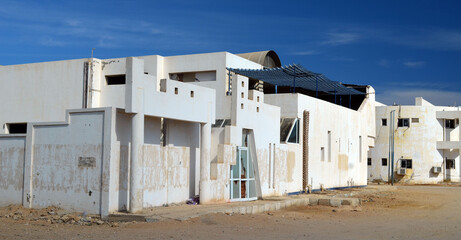 Obraz na płótnie Canvas Residential non tourist area. White apartment buildings. Sharm El Sheikh, Egypt 