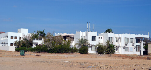 Residential non tourist area. White apartment buildings. Sharm El Sheikh, Egypt 