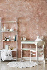 Interior of stylish room with modern workplace and book shelf