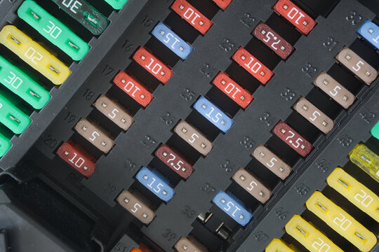 Car fuse box multicolor and multi protection current fused, Power distribution box in car on background.	