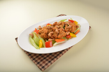 deep fried chicken cutlet chop with cashew nut and vegetables main course asian halal menu