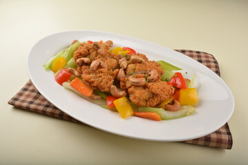 deep fried chicken cutlet chop with cashew nut and vegetables main course asian halal menu