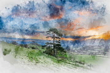 Digital watercolour painting of Beautiful vibrant sunrise landscape image of Colmer's Hill in Dorset on a Spring morning