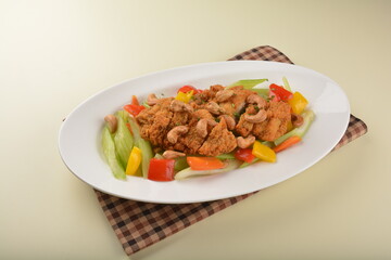 deep fried chicken cutlet chop with cashew nut and vegetables main course asian halal menu