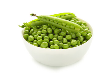 Green pea in bowl isolated on white background. Organic fresh vegetables. Healthy eating.