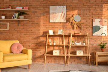 Fototapeta na wymiar Interior of stylish living room with book shelves