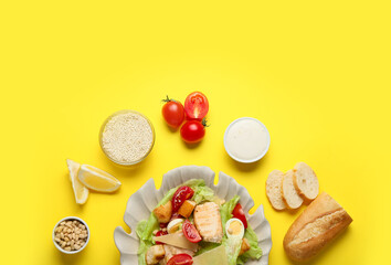 Plate of tasty Caesar salad and ingredients on color background