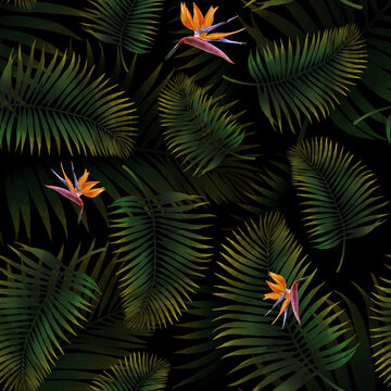 A seamless pattern of green palm leaves and exotic 
flowers. You can use it for your own design.