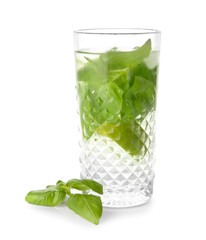 Glass of lemonade with basil on white background
