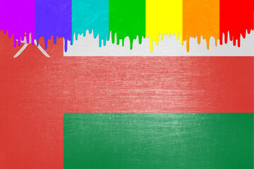 Paint (rainbow flag) is dripping over the national flag of Oman