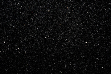 Black background glitter stars in beautiful style on dust. Luxury cosmic glitz effect. Night sky...