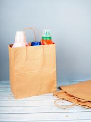 Craft bag with cans and bottles for cleaning the house, household bag with household chemicals