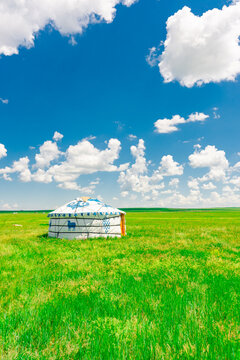 The traditional Mongolian tents on the Hulunbuir grassland in Inner Mongolia, China.