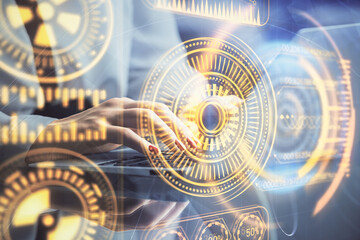 Double exposure of woman hands typing on computer and technology theme drawing. High Tech concept.