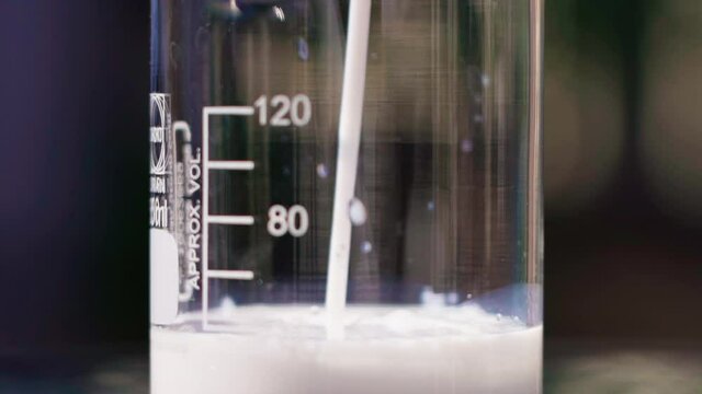 pour white emulsion to beaker