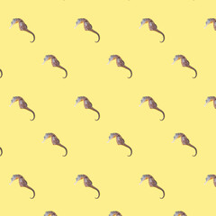 Obraz premium Colorful cotton fabric with fish pattern on yellow for background or texture