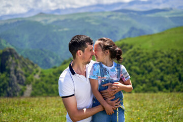 dad and daughter hug and happy