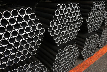 Steel round pipe packaging in factory.