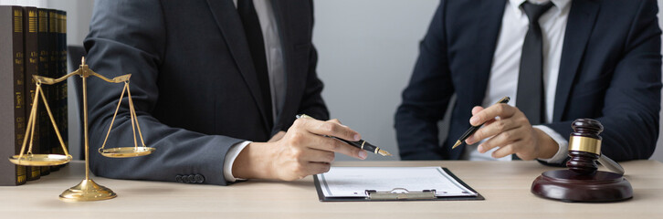 Lawyer or judge has recommend a client sign a legal agreement in the courtroom, Legal Agreement...