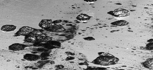 black dense fluid over the water