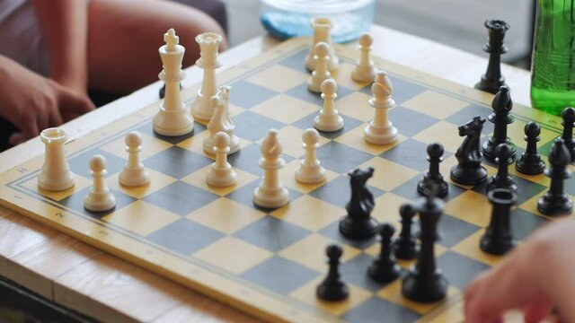 Bishop chess move black figure closeup slow motion