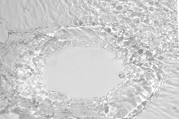 Transparent white colored clear water surface texture with ripples, splashes and bubbles. Nature...