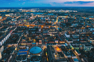Brest, Belarus. Aerial Bird's-eye View Of Brest Cityscape Skyline. Night Bird's-eye View Of Brest...