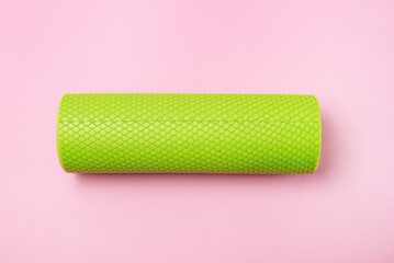 Foam Back Roll for Massage or MFR Pink Background Minimal Fitness or Yoga Concept Top View