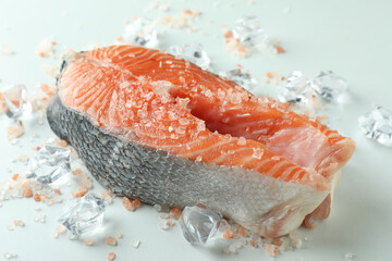 Fresh raw salmon and spices on white background