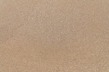 Fototapeta na wymiar Textura de arena dorada de playa