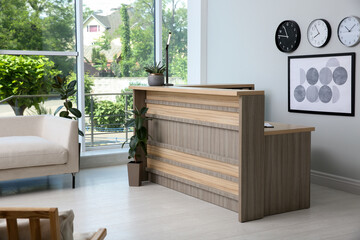 Lobby interior with stylish wooden receptionist desk