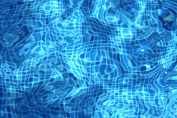 Bottom of a pool seen through the water