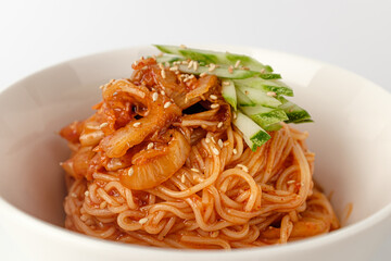 Seasoned noodles on a white background