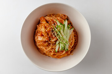 Seasoned noodles on a white background