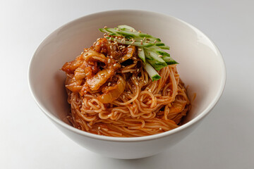 Seasoned noodles on a white background