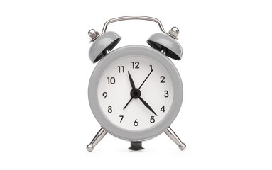 Retro analog table alarm clock with round face isolated on white background