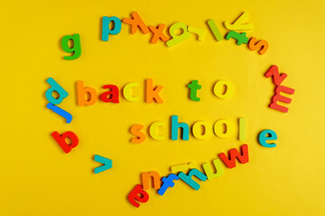 Fototapeta premium Back to school on a yellow background. Website, video blog. Yellow background