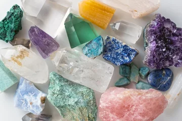 Fototapeten Background of beautiful crystals and colorful gemstones © Demetrio
