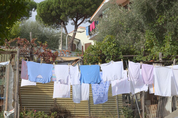 Clothes hanging outside to dry in a village in italy