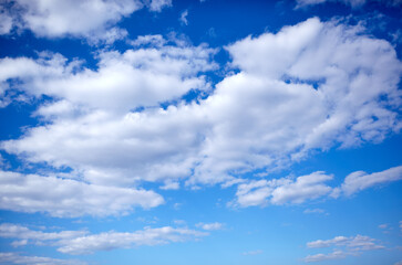 Abstract image of blurred sky. Blue sky background with cumulus clouds