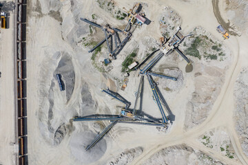The Gneiss Mine, opencast mine in the countryside in Poland. Mine in a villae from drone aerial drone photo view.
