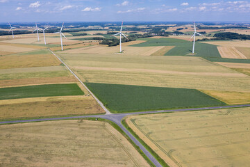 Obraz premium Village from drone aerial view. Beautiful village with houses and fields in Nysa, Poland. Polish farmland