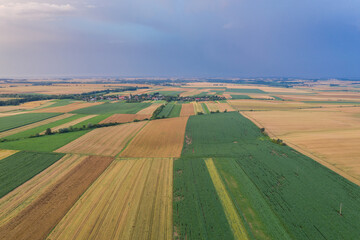 Storm in the countryside. Village from drone aerial view. Beautiful village with houses and fields in Nysa, Poland. Polish farmland