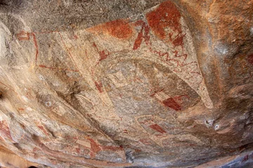 Fotobehang Ancient rock painting of human and livestock cow. In Laas Geel, Somaliland, Africa © Yz-Wu