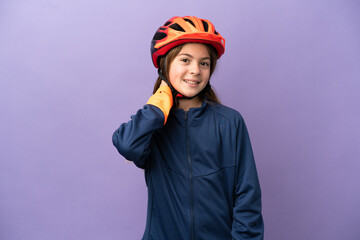 Little caucasian girl isolated on purple background laughing