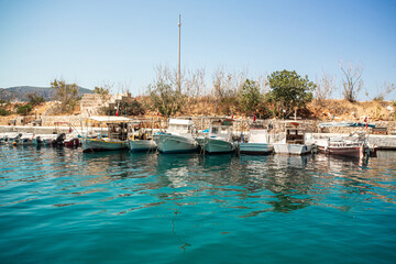 Fototapeta na wymiar Small boats at the harbor in Antalya's Kaş district