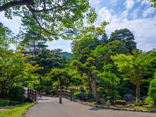 Pond with bridge in a park (Yahiko park, Yahiko, Niigata, Japan)